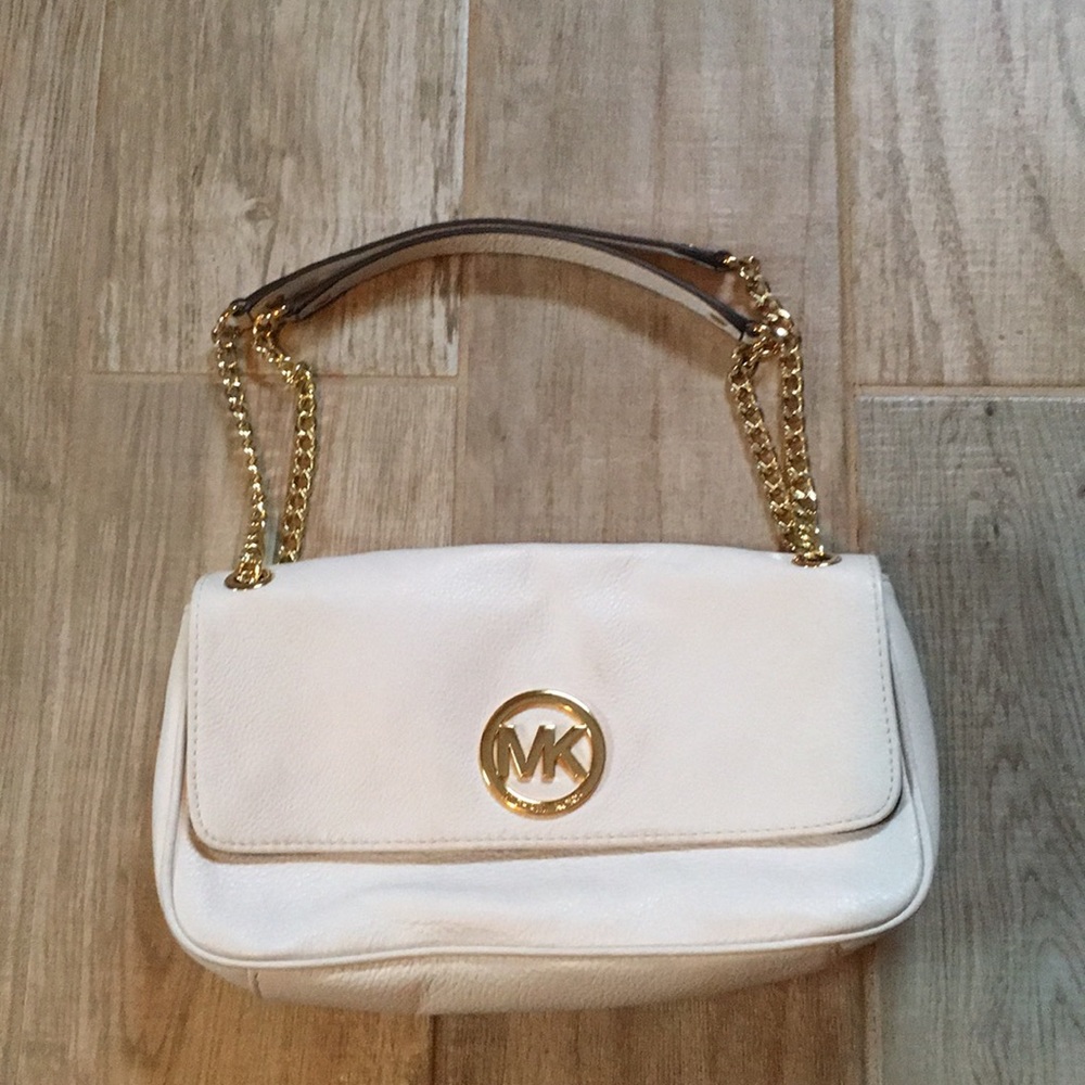 Michael Kors off white purse with gold accents